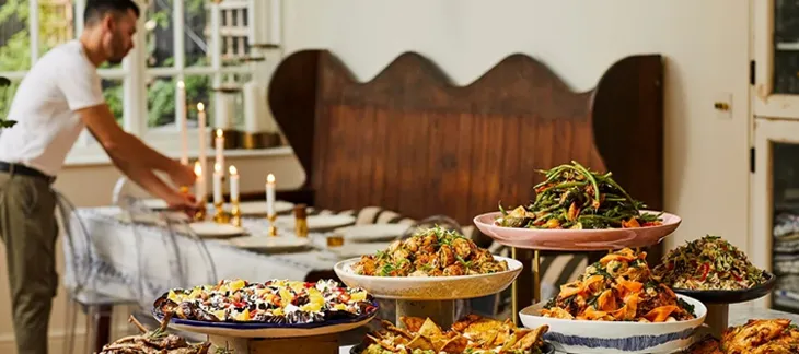 Colorful breakfast spread at Ottolenghi with fresh pastries, salads, and artisan breads