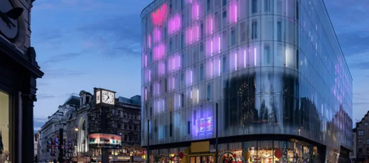 Futuristic glass façade of W London hotel in Leicester Square