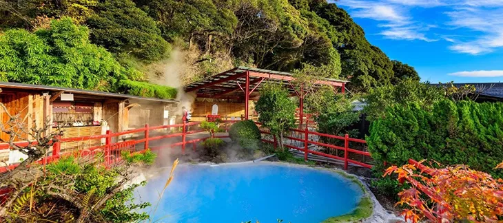 Steaming hot spring pools and geothermal landscapes in Beppu