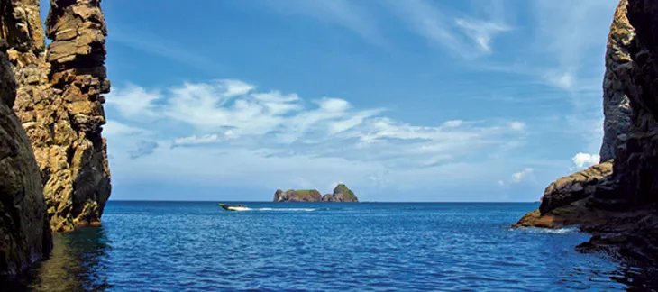 Scenic coastal cliffs and forested islands at Dadohaehaesang National Park