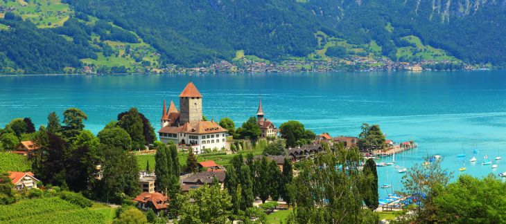 Medieval Thun Castle overlooking the Aare River in Thun