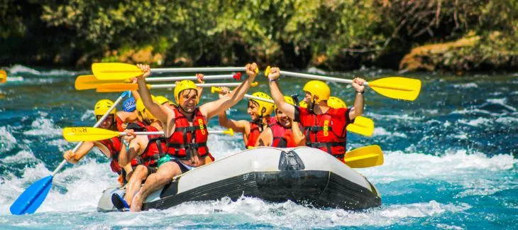 Adventurers enjoying thrilling whitewater rafting on Bosnian rivers