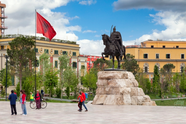 Arooha guest at Skanderbeg monument in Tirana during Albania tour packages from Dubai