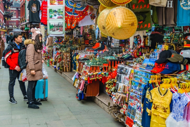 Arooha guest at street market in Shanghai, China