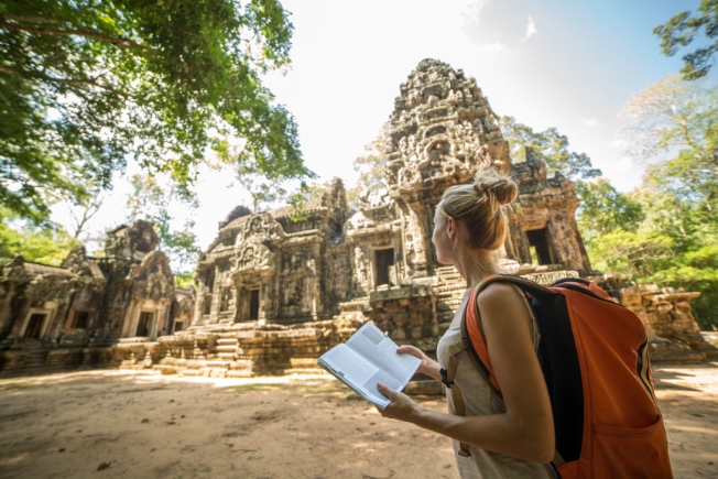Arooha guest with travel guide book at Siem Reap,Cambodia