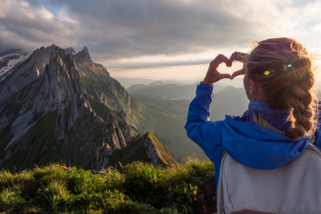 Arooha guest enjoying mountain vacation during Switzerland tour packages from Dubai