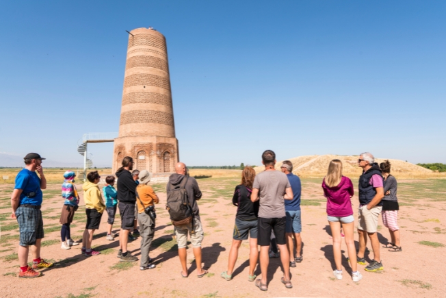 Arooha guest tourists at Burana Tower in Kyrgyzstan
