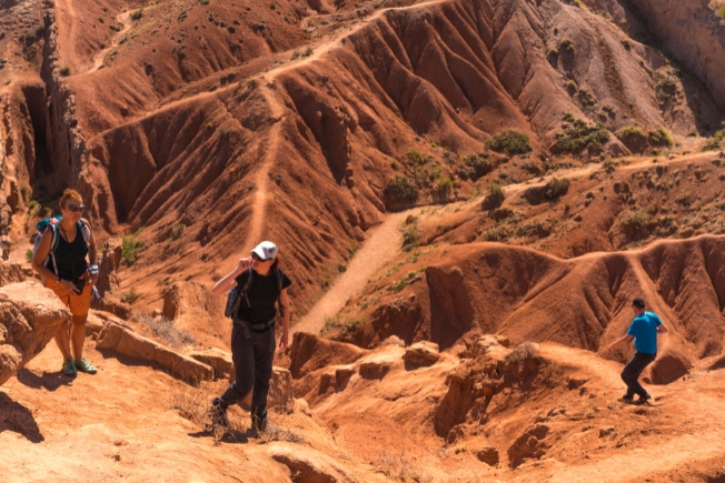 Arooha guest tourists in The Fairy Tale Canyon, Skazka, Kyrgyzstan