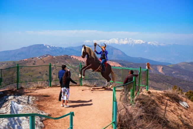 Arooha guest on horse at Chimgan Mountain in Uzbekistan