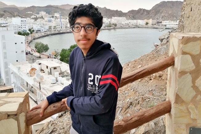 Arooha guest posing for picture during Salalah tour packages from Dubai
