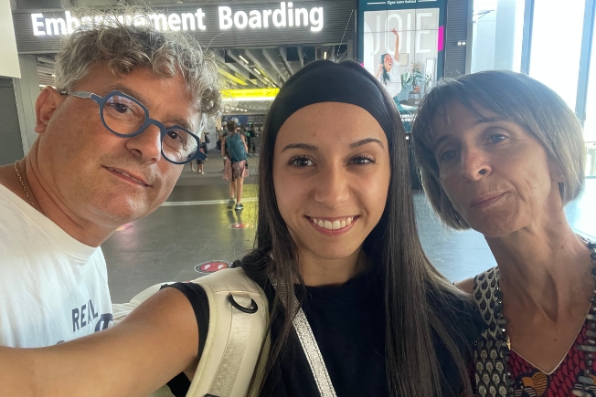Arooha guest standing at airport in Azerbaijan