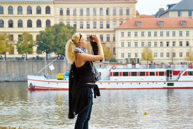 Arooha guest taking picture in Prague