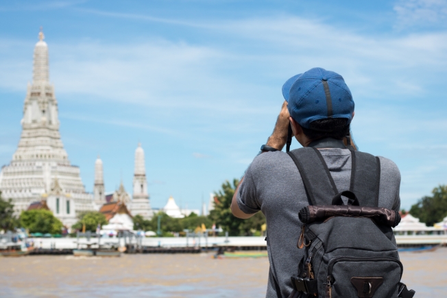 Arooha guest tourist and photographer Take Photo at Wat Arun Temple in Bangkok Thailand
