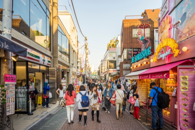 Arooha guests at Takeshita street in Tokyo during Japan tour packages from Dubai