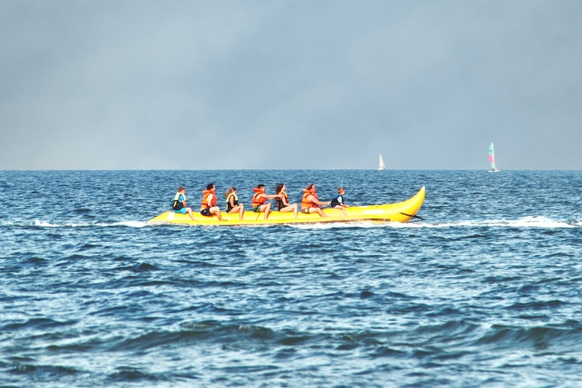 Arooha tourist riding Banana boat at the Baltic Sea
