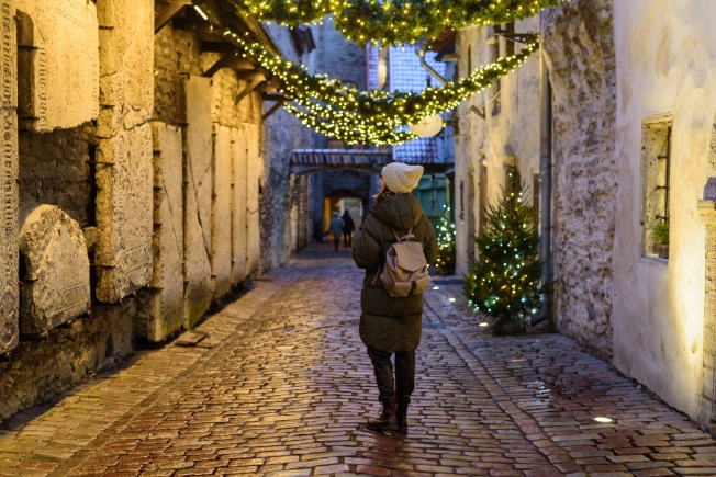 Aroohas woman tourist in Tallinn, Estonia