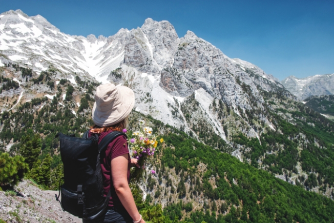 Arooha tourist viewing the Aalbanian Alps